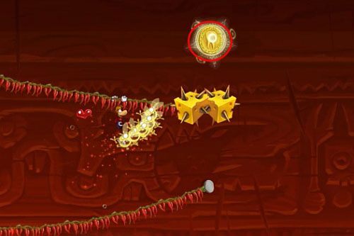 Za drzwiami zjeżdżając po lianach zbierz kolejną M, uważając na ogień - Pieruńsko gorące (300 L, 2:40); Naprawa szczeliny (175 L) | Kraina Smakoszy - Rayman Origins - poradnik do gry