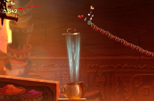 Za drzwiami z okiem znajdziesz ostatnią klatkę z E, której zniszczenie zakończy poziom - Pieruńsko gorące (300 L, 2:40); Naprawa szczeliny (175 L) | Kraina Smakoszy - Rayman Origins - poradnik do gry