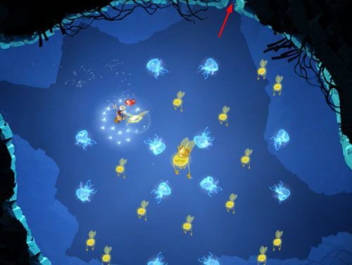 Płynąc dalej, ponownie trzymaj się blisko ryby oświetlającej drogę, aż dotrzesz do drzwi z okiem - Pływanie z Gwiazdami (300 L, 1:25) | Morze Szczęśliwości | Rayman Origins - Rayman Origins - poradnik do gry