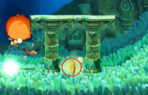 Za drzwiami z okiem znajdziesz ostatnią klatkę z E - Przeklęta płetwa (300 L, 2:20); Złe bańki i nie tylko (175 L) | Morze Szczęśliwości - Rayman Origins - poradnik do gry