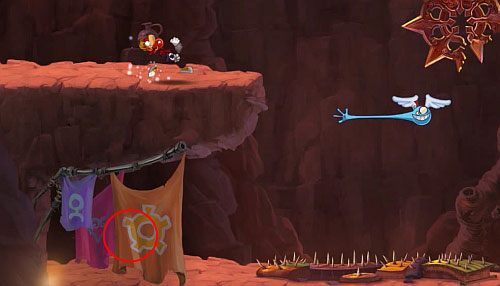 Przed kolejnymi drzwiami z okiem pomiędzy przeciwnikami znajdziesz M - Magiczne Małpki (300 L, 3:00); Droga Elektrunów (175 L) | Mistyczny Szczyt - Rayman Origins - poradnik do gry