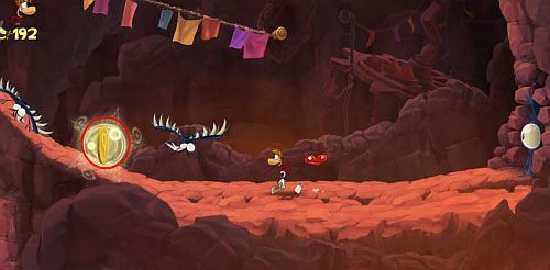 Za drzwiami wbiegnij na samą górę po drodze zdobywając S, niszcząc Żalumek i zbierając LK i L dzięki linom do zjeżdżania - Magiczne Małpki (300 L, 3:00); Droga Elektrunów (175 L) | Mistyczny Szczyt - Rayman Origins - poradnik do gry