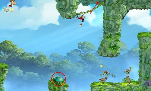 Dalej miniesz roślinkę, a opadająca skała otworzy przejście do M - Zejdź mi z drogi (300 L, 1:20) | Świątynia Łaskotek | Rayman Origins - Rayman Origins - poradnik do gry