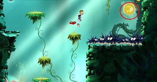 Trochę pod platformą jest LK, a po lewej stronie Żalumek (5 L) - Biedna mała stokrotka (100 L); Zabawy w cieniu | Świątynia Łaskotek - Rayman Origins - poradnik do gry