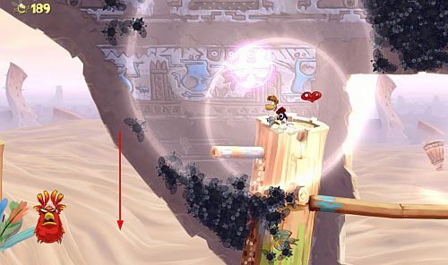 Dalej uderzaj napotkane pierścienie, które oświetlą twoją drogę - Dzikie roje (300 L, 2:10) | Ględzoce Groty | Rayman Origins - Rayman Origins - poradnik do gry