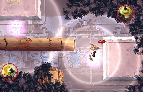 Przed następnymi drzwiami, skocz z atakiem na bęben, by sięgnąć bujawki - Dzikie roje (300 L, 2:10) | Ględzoce Groty | Rayman Origins - Rayman Origins - poradnik do gry