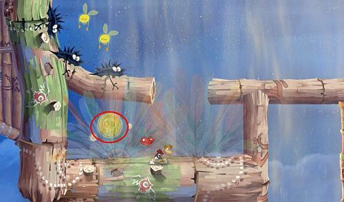 Szybując dalej w górę zdobędziesz S oraz następną M - Podstępne wiatry (300 L, 2:35) | Ględzoce Groty | Rayman Origins - Rayman Origins - poradnik do gry