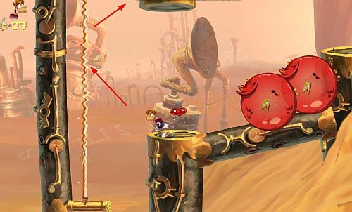 Kawałek dalej skocz z atakiem na duży bęben, by zniszczyć Żalumek oraz dostać się do M - Nie strzelaj do DJ-a (300 L); Wysokie napięcie (300 L, 1:45) | Ględzoce Groty - Rayman Origins - poradnik do gry