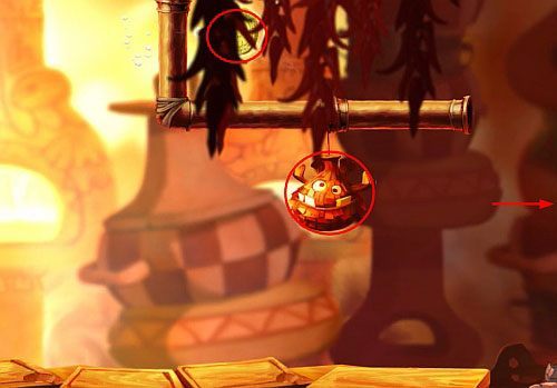 Zaraz za drzwiami z okiem, znajdziesz wejście do drugiego pomieszczenia z klatka z E - Smocza zupa (300 L, 2:25) | Słodkie Jeziora | Rayman Origins - Rayman Origins - poradnik do gry