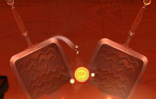 Dalej znajdziesz kolejny Żalumek - Smocza zupa (300 L, 2:25) | Słodkie Jeziora | Rayman Origins - Rayman Origins - poradnik do gry