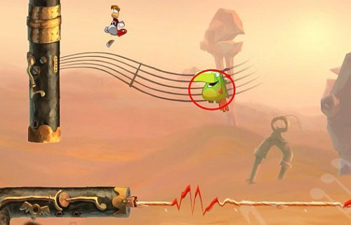 Po minięciu roślinki z 8 L dotrzesz do jednookiej papugi, na którą skocz z atakiem, aby dostać się do platformy z M - Najlepszy podkład muzyczny (300 L, 2:00) | Pustynia Dijirdów | Rayman Origins - Rayman Origins - poradnik do gry