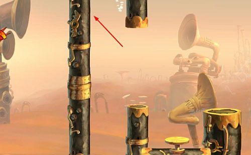 Po naciśnięciu przycisku oznaczonego strzałką i skoczeniu na papugę pojawi się 10 L - Najlepszy podkład muzyczny (300 L, 2:00) | Pustynia Dijirdów | Rayman Origins - Rayman Origins - poradnik do gry