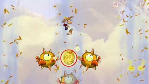 W następnej kolejności, ponownie korzystając z szybowania, znajdziesz przejście do sekretnego pomieszczenia z E - Wiatr albo przewóz (300 L, 2:20) | Pustynia Dijirdów | Rayman Origins - Rayman Origins - poradnik do gry