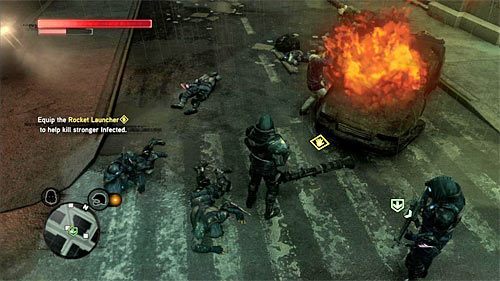 Po raz kolejny wznów przemarsz, a po znalezieniu się w pobliżu nowej grupy potworów podnieś zgodnie z sugestią członków drużyny leżącą na ziemi wyrzutnię rakiet - 15 - A Stranger Among Us | Główny wątek fabularny Prototype 2 - Prototype 2 - poradnik do gry