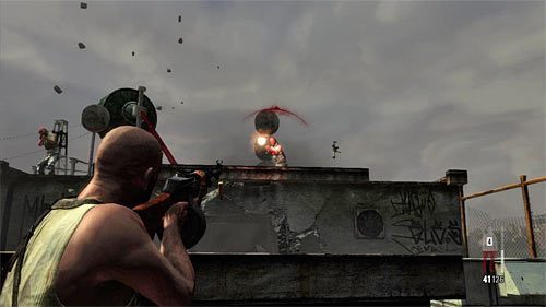 Po dotarciu na ostatni dach zbliż się do widocznych w oddali zamkniętych zielonych drzwi - Ucieczka z hotelu | Rozdział XII | Solucja Max Payne 3 - Max Payne 3 - poradnik do gry