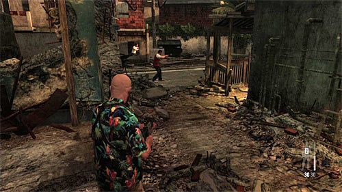 Zeskocz na niższy poziom, a następnie udaj się w stronę jednej z głównych ulic dzielnicy, na której toczą się zażarte walki - Dotarcie do jednej z głównych ulic dzielnicy | Rozdział IX | Solucja Max Payne 3 - Max Payne 3 - poradnik do gry