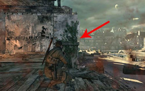 Gdy zeskoczysz z ruin na ulice, w budynku w oddali pojawi się wrogi snajper - Misja 8 - Sztab Kreuzberg (1) | Opis przejścia Sniper Elite V2 - Sniper Elite V2 - poradnik do gry