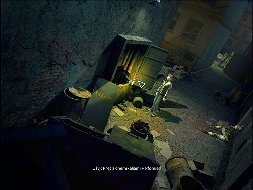 W tym celu udaj się (wyjście ze stacji w głębi ekranu po prawej) pod bramę zakładów przemysłowych, skąd skieruj się w stronę kontenera i dalej w widoczną za nim aleję - Poradnik do gry - Prolog - Doładuj bilet | Alternativa - Alternativa - poradnik do gry