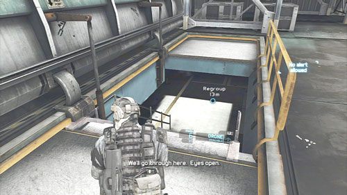 Po oczyszczeniu terenu wchodzimy do hangaru i zbiegamy po schodach do punktu zbiórki - Misja 6 Firefly Rain (2) | Opis przejścia Ghost Recon - Future Soldier - Tom Clancys Ghost Recon: Future Soldier - poradnik do gry