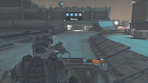 Po walce opuszczamy hangar i podbiegamy do stojącego na zewnątrz pojazdu by zasiąść za sterami działka - Misja 6 Firefly Rain (3) | Opis przejścia Ghost Recon - Future Soldier - Tom Clancys Ghost Recon: Future Soldier - poradnik do gry