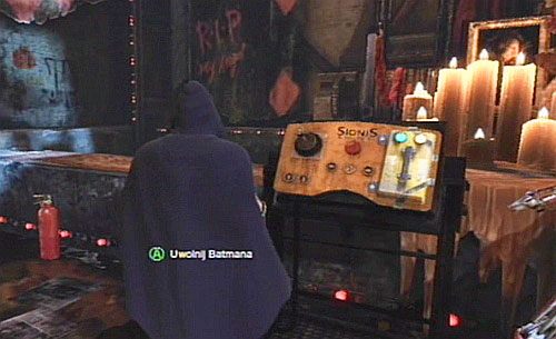 Po walce użyj klucz na panelu, by uwolnić Batmana - Uratuj Batmana z rąk Harley Quinn - Opis przejścia - Batman: Arkham City - Harley Quinns Revenge - poradnik do gry