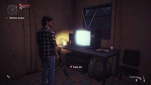 Telewizor znajduje się w stróżówce, obok parkingu dla aut przy wielkim ekranem kinowym - Telewizory | Sekrety (audycje, skrzynie, telewizory) - Alan Wakes American Nightmare - poradnik do gry