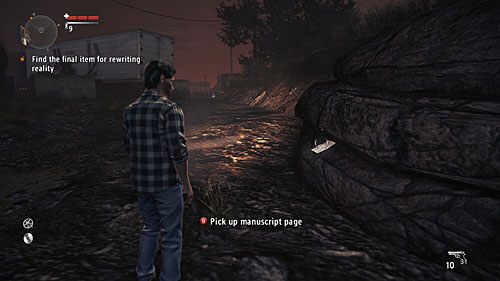 Strona jest przyczepiona do wielkiego kamienia za postojem ciężarówek - Akt I - The Mechanic | Strony manuskryptu | Alan Wakes American Nightmare - Alan Wakes American Nightmare - poradnik do gry