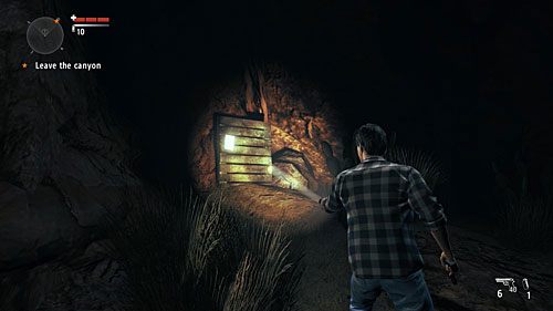 Strona jest przyczepiona do wbitej w ziemię pionowo drewnianej palety w kanionie - Akt III - Resolved | Strony manuskryptu | Alan Wakes American Nightmare - Alan Wakes American Nightmare - poradnik do gry