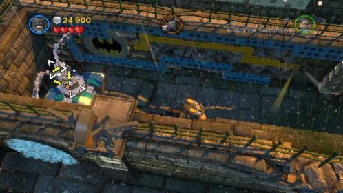 Przejdź kawałek dalej i zniszcz srebrną statuę (obrazek), a z klocków, które się pojawią zbuduj platformę - Awantura w Arkham | Opis przejścia LEGO Batman 2 DC Super Heroes - LEGO Batman 2: DC Super Heroes - poradnik do gry