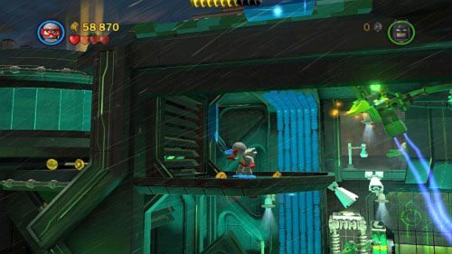 Następnie wejdź na piętro korzystając z niebieskich rur, wyciągnij magnezem drugi mechanizm (obrazek) i zniszcz go - Chemiczny ślad | Opis przejścia LEGO Batman 2 DC Super Heroes - LEGO Batman 2: DC Super Heroes - poradnik do gry