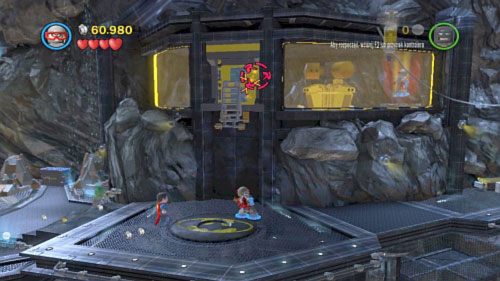 Przejdź Robinem na centralną platformę i kieruj się w prawo, aż do pomieszczenia z żółtymi szybami - Nieproszeni goście | Opis przejścia LEGO Batman 2 DC Super Heroes - LEGO Batman 2: DC Super Heroes - poradnik do gry