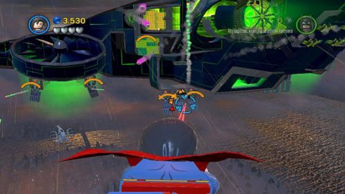 W pierwszej fazie twoim zadaniem będzie ostrzeliwanie wrogich śmigłowców oraz newralgicznych punktów samolotu (obrazek), które będą zaznaczane - Kierunek - Metropolis | Opis przejścia LEGO Batman 2 DC Super Heroes - LEGO Batman 2: DC Super Heroes - poradnik do gry