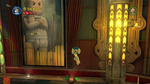 #03 - Skieruj się na prawą stronę sali i wbij drążek gimnastyczny w otwór w ścianie - Na deskach teatru | Minizestawy LEGO Batman 2 DC Super Heroes - LEGO Batman 2: DC Super Heroes - poradnik do gry