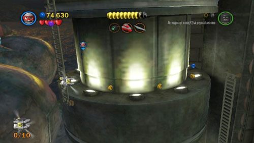 #05 - Po wejściu na szczyt budynku i przejechaniu po linie na obrotowy filar z lewej, zejdź po drabinie piętro niżej i po gzymsie przejdź w lewo - Współudział | Minizestawy LEGO Batman 2 DC Super Heroes - LEGO Batman 2: DC Super Heroes - poradnik do gry