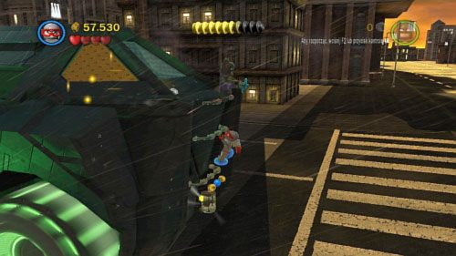 #09 - Kiedy dotrzesz do prawej krawędzi dachu w pojeździe Jokera zeskocz i złap się barierek - Chemiczny ślad | Minizestawy LEGO Batman 2 DC Super Heroes - LEGO Batman 2: DC Super Heroes - poradnik do gry