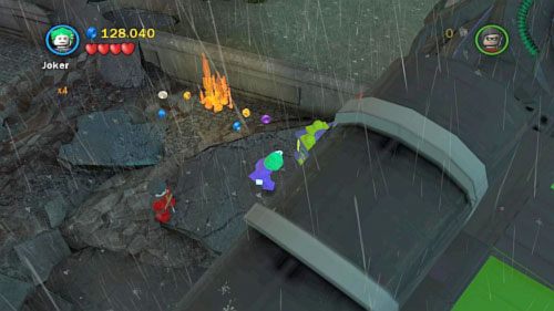 #08 - Przejdź do lokacji na prawo od rakiety i otwórz pudełko Jokerem - Bohaterowie, do boju | Minizestawy LEGO Batman 2 DC Super Heroes - LEGO Batman 2: DC Super Heroes - poradnik do gry