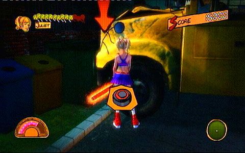 Gdy walka dobiegnie końca, podejdź do przedniego koła blokującego drogę pojazdu i wciśnij kółko - Prolog - pierwsze kroki | Opis przejścia Lollipop Chainsaw - Lollipop Chainsaw - poradnik do gry