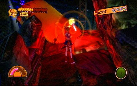 Wykonawszy ostatni unik, zbierz leżącego niedaleko lizaka i zeskocz na scenę - 1 - Highschool - walka z Zedem | Opis przejścia Lollipop Chainsaw - Lollipop Chainsaw - poradnik do gry