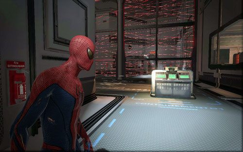 Za korytarzem z dużą szybą zobaczysz ścianę czerwonych laserów - 06 - Smythe Strikes Back - komputery i roboty - Opis przejścia - Niesamowity Spider-Man - poradnik do gry