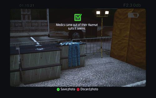 Musisz zrobić zdjęcie niebieskich kombinezonów powieszonych na ogrodzeniu za dużym autobusem - Photo Articles - Zadania poboczne - Niesamowity Spider-Man - poradnik do gry