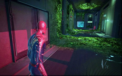 Podążając za uruchomioną przez Gwen windą, dotrzesz do korytarza z kilkoma robotami - 06 - Smythe Strikes Back - Części technologii, Zdjęcia - Znajdźki - Niesamowity Spider-Man - poradnik do gry