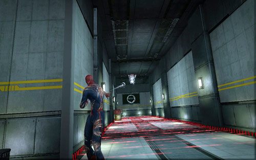 Gdy uda cię się uciesz przed pościgiem robotów, trafisz do długie korytarza z wieżyczkami - 10 - Spider-Man No More! - Instrukcje, Części technologii - Znajdźki - Niesamowity Spider-Man - poradnik do gry