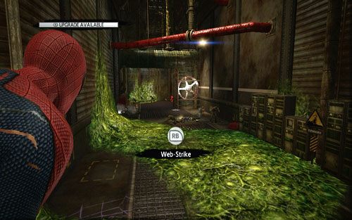 Pod czerwonymi rurami zobaczysz kilku przeciwników, a obok nich kolejny magazyn - Train Docking Station - Znajdźki - Niesamowity Spider-Man - poradnik do gry