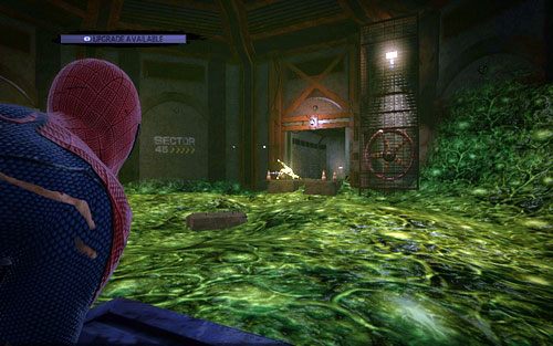 Wróć teraz do pomieszczenia z kwasem i wybierz korytarz z prawej - Train Docking Station - Znajdźki - Niesamowity Spider-Man - poradnik do gry