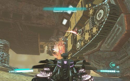 Wróć pod kadłub pojazdu i zacznij rozprawiać się z atakującymi cię wrogami (uważaj zwłaszcza na latających przeciwników) - Rozdział 7 - Belly of the Beast | Opis przejścia - Transformers: Upadek Cybertronu - poradnik do gry