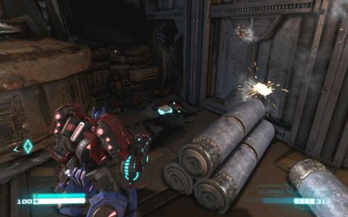 Po napotkaniu broniących się, sojuszniczych robotów zeskocz na dół i udaj się na platformę z prawej - Audio Logs - rozdziały 1-6 | Audio Logs | Transformers Upadek Cybertronu - Transformers: Upadek Cybertronu - poradnik do gry