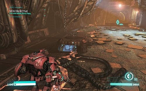 Kiedy twój towarzysz otworzy ci duże wrota przejdź do następnego korytarza i spójrz w lewo na ziemię - Poradnik do gry - Blueprints | Transformers Upadek Cybertronu - Transformers: Upadek Cybertronu - poradnik do gry