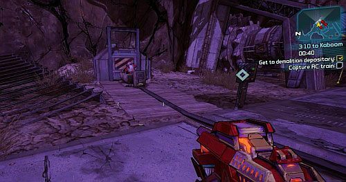 Następnie naciśnij przycisk, za Twoimi plecami - 3:10 to Kaboom | Misje poboczne - Lynchwood | Borderlands 2 - Borderlands 2 - poradnik do gry