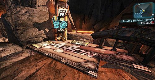 Dookoła areny rozmieszczone są urządzenia, które Użyj, by otrzymać skrzynię z amunicją - The Talon of God | Zadania główne w Borderlands 2 - Borderlands 2 - poradnik do gry