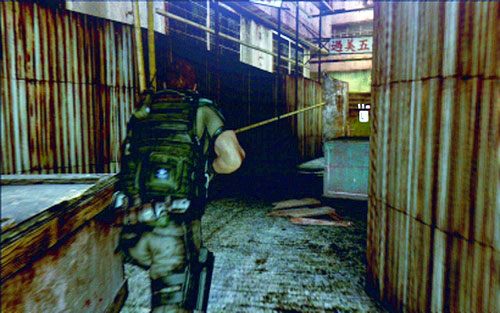 Zeskocz przez nią na dół i wywarz drzwi na końcu zaułka - 1 - Miejskie zaułki | Kampania Chrisa | Solucja Resident Evil 6 - Resident Evil 6 - poradnik do gry